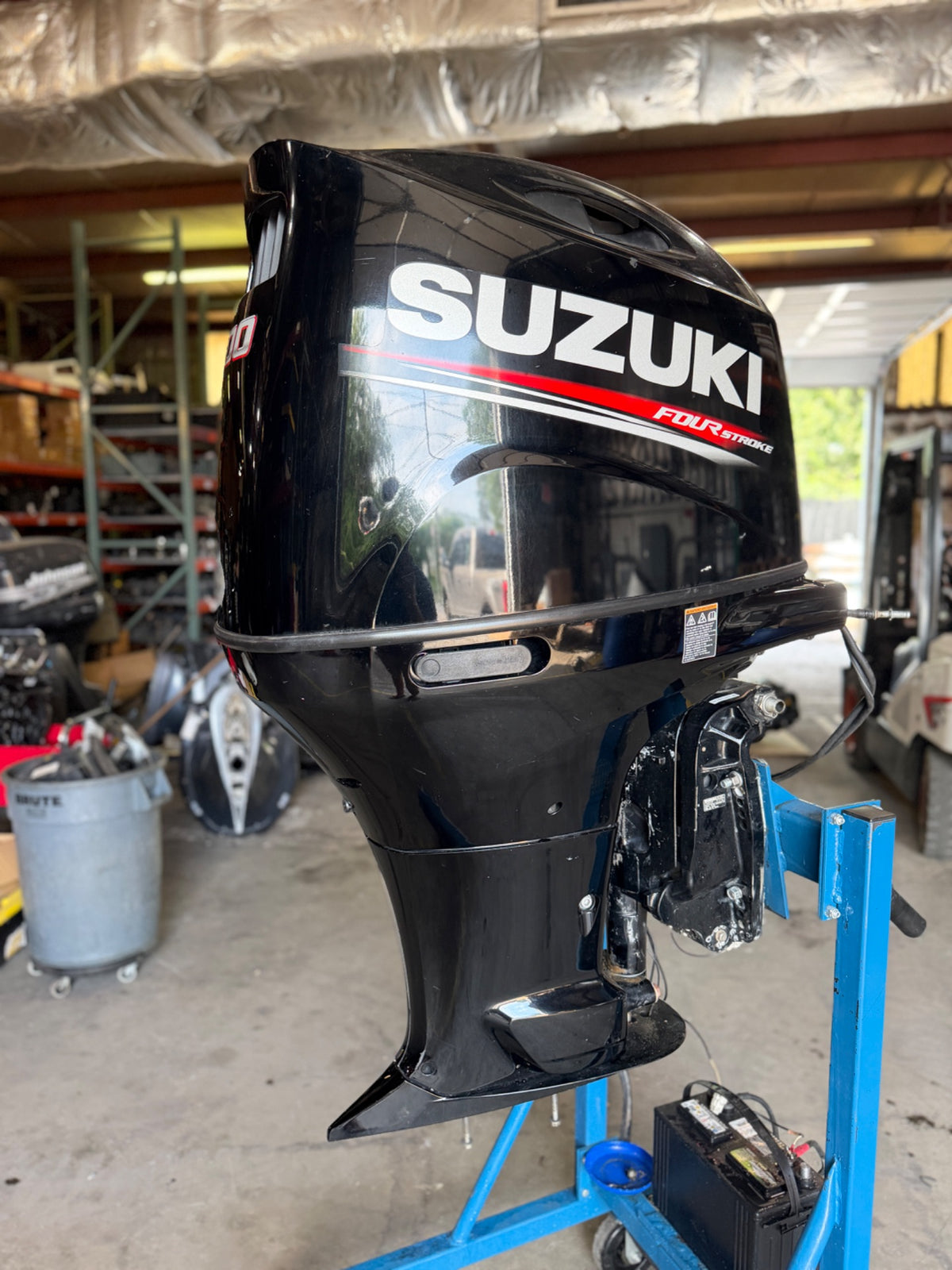 Starboard view of 2017 Suzuki DF200ATX2 donor motor M-001067; lower unit removed; complete motor not for sale